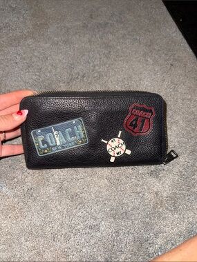 Coach black pebbled leather zip-around wallet